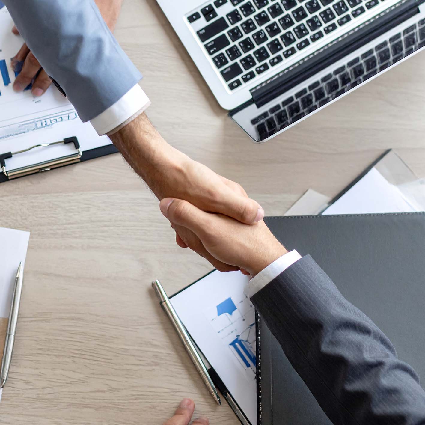 Handshake Agreement Two Business Professionals in a Handshake Agreement
